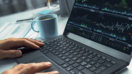 Aufkleber - Close Up On Hands Of Professional Financial Analyst Using Laptop Computer With Stock Options Graphs And Charts On Screen. Man Analyzing Stock Market Data And Enjoying Coffee In Hedge Fund Office.