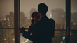 © stockbusters - Silhouettes couple dancing date evening cityscape kitchen closeup. Spouses dance