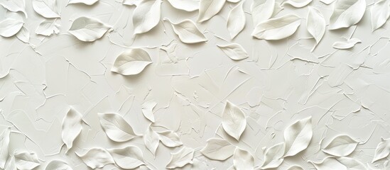Poster - A white backdrop adorned with textured leaf patterns creating a charming copy space image