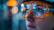 © jr-art - A woman wearing orange safety goggles is looking at something