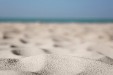 Wall Mural - Beautiful sandy beach and sea on sunny day, closeup. Summer vacation