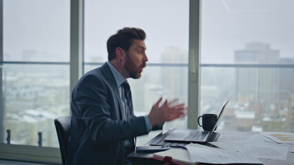 Poster - Nervous director arguing online at panoramic room closeup. Ceo closing laptop