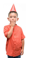 Canvas Print - Dark haired little child wearing birthday cap cover mouth with hand shocked with shame for mistake, expression of fear, scared in silence, secret concept