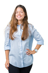 Wall Mural - Young beautiful brunette business woman over isolated background winking looking at the camera with sexy expression, cheerful and happy face.