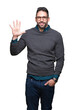 © Krakenimages.com - Young handsome man wearing glasses over isolated background showing and pointing up with fingers number five while smiling confident and happy.