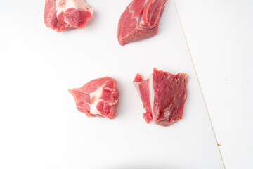 Wall Mural - Raw mutton fillet isolated, lamb meat pieces, tenderloin or mutton sirloin meat. Fresh sheep fillet