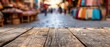 © JK_kyoto - In a vibrant marketplace, a selected focus empty wooden table with copy space stands ready for new memories