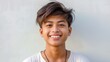 © gn8 - Filipino Teenage Boy's Bright Smile, Ideal for Youth and Diversity Representation in Media Campaigns