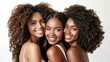 © SC Media - Three young beautiful smiling diverse women friends with long salon styled hair posing together, healthy locks. isolated white background. Friends Group