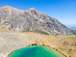 Poster - The aerial views of Green Lake, a crater lake, is on the Gömbe Plateau, famous for its unique geographical riches.