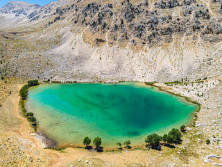 Poster - The aerial views of Green Lake, a crater lake, is on the Gömbe Plateau, famous for its unique geographical riches.