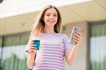 Poster - Photo of pretty cheerful lady wear violet t-shirt chatting modern device enjoying drinking beverage outdoors urban city street