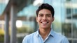 © gn8 - Young Hispanic Professional Smiling Confidently, Business Portrait Outdoors, Corporate Office Background