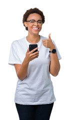 Sticker - Young african american woman using smartphone over isolated background happy with big smile doing ok sign, thumb up with fingers, excellent sign