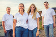 © Louis-Paul Photo - big family at beach on summer time, relax and support. Sunset, nature and smile with parents, kids walking by the sea for vacation