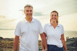 © Louis-Paul Photo - Happy Romantic Mature Couple Enjoying Sunset on the Beach