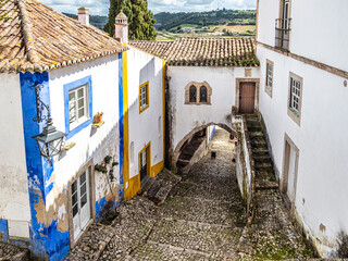 Wall Mural - View of Obidos with renaissance Church of Saint Mary, Santa Maria at Obidos, Portugal