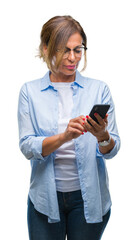 middle age senior woman texting sending message using smartphone over isolated background with a con
