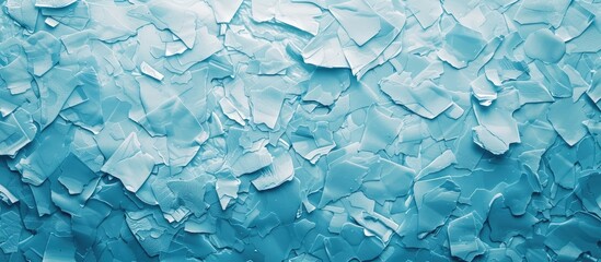 Sticker - Abstract light blue backdrop with white and gray regions featuring a texture resembling pressed wood chips ideal for a copy space image