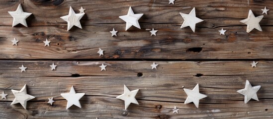 Wall Mural - Christmas card backdrop featuring white wooden star shapes decoration for a delightful copy space image