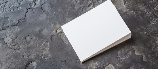 Poster - Top view of blank business cards on a dark grey backdrop perfect for adding designs with a copy space image