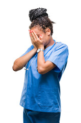 Poster - Young braided hair african american girl professional surgeon over isolated background with sad expression covering face with hands while crying. Depression concept.