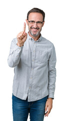 Poster - Handsome middle age elegant senior man wearing glasses over isolated background showing and pointing up with finger number one while smiling confident and happy.