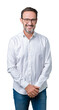 © Krakenimages.com - Handsome middle age elegant senior business man wearing glasses over isolated background with a happy and cool smile on face. Lucky person.