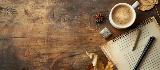 Poster - View from above of an office table adorned with supplies and a coffee cup, offering ample copy space for text.