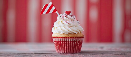 Poster - A cupcake adorned with a decorative flag, creating an appealing visual with copy space image potential.