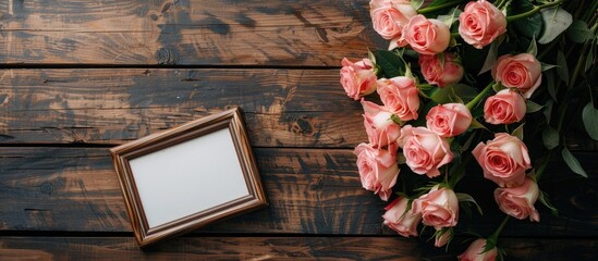 Aufkleber - Wooden table featuring a bouquet of rose flowers and a photo frame, ideal for occasions like anniversaries, Mother's Day, or Women's Day. Perfect for a copy space image.