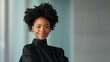 © DARIKA - African businessperson smiling while discussing a project in a modern office representing professional success and confidence Portrait, Realistic Photo, High resolution, Half-body picture, Minimalism,