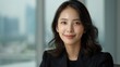 © DARIKA - Asian businesswoman smiling while negotiating a deal in a corporate boardroom representing business acumen and confidence Portrait, Realistic Photo, High resolution, Half-body picture, Minimalism,