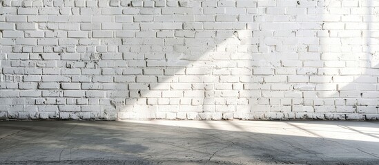 Leinwandbilder - Background with a white brick wall providing empty space for text or images, also known as a copy space image.