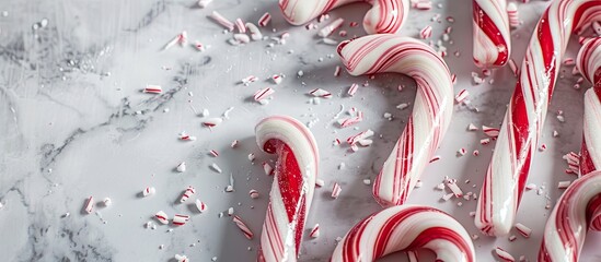 Aufkleber - Candy canes displayed with a marble backdrop, providing an elegant frame for the confectionery in a visually appealing copy space image.