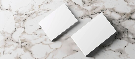 Leinwandbilder - Top view of a business card or invitation mockup displayed on a marble table with copy space image.