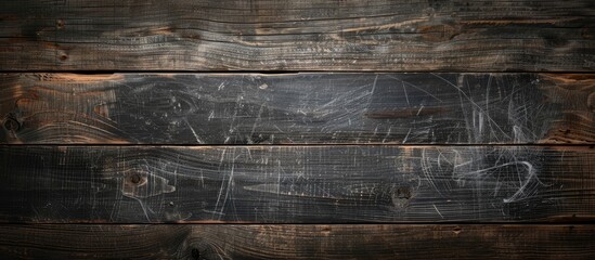 Poster - A blackboard displayed on a rustic wooden background, providing ample copy space for text or images.