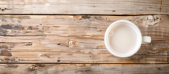 Aufkleber - Wooden surface with white mug and water, with copy space image.