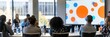 © SKIMP Art - A group of people sitting at round tables, listening to someone on stage presenting something in front of an LED screen with orange and blue color circles Generative AI