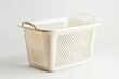 © Fotograf - A simple white plastic basket with handles against a clean white background, ideal for showcasing products or providing a blank space for text overlays