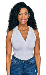 Sticker - Middle age african american woman wearing casual style with sleeveless shirt with a happy and cool smile on face. lucky person.