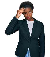 Sticker - Young african american girl wearing business clothes worried and stressed about a problem with hand on forehead, nervous and anxious for crisis