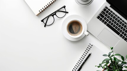 Wall Mural - Office desk with a white table featuring a blank notebook computer supplies and a coffee cup Top view with space for text Flat lay composition
