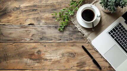 Wall Mural - Work from home concept Office desk setup with a laptop blank notepad coffee cup and pen on a wooden table Top view with copy space in a flat lay style