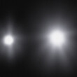 © ArtPixel-Portfolio - Grainy texture with dual light sources against a dark backdrop, perfect for design work