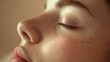 © Hafiz - Peaceful sleeping face of a woman against a plain background, with copy space