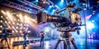 © Man888 - Professional television camera setup on tripod, capturing live event, with lens focused, studio lights illuminating, and cables neatly organized in the background.
