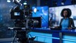 © Gethuk_Studio - A television camera is focused on a news anchor in a professional studio setting.