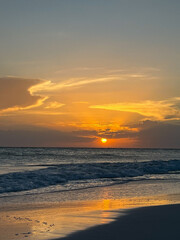 Wall Mural - ocean sunset on the beach in florida with colorful skies.