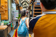 © CandyRetriever  - Happy Asian man and woman couple enjoy and fun outdoor lifestyle travel in the city walking and shopping together at Chatuchak weekend street market in Bangkok, Thailand on summer holiday vacation.